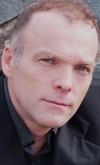 фото Хью Томпсон