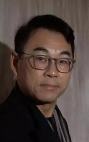 фото Энди Тай