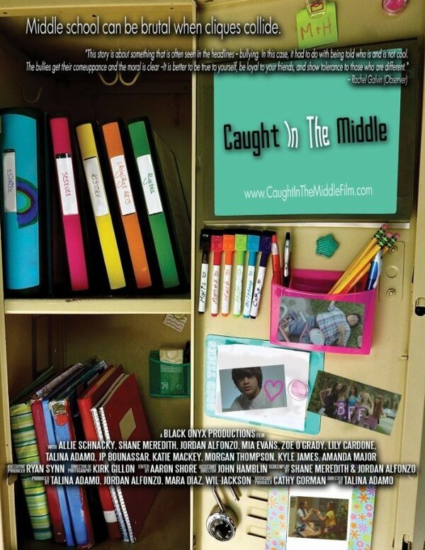 Постер Caught in the Middle