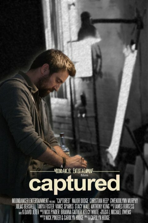 Постер Captured